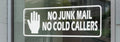 No Junk Mail No Cold Callers decal on shop window - White