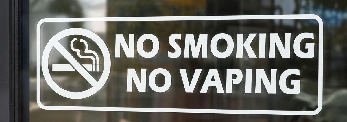 No Smoking No Vaping decal on shop window - White